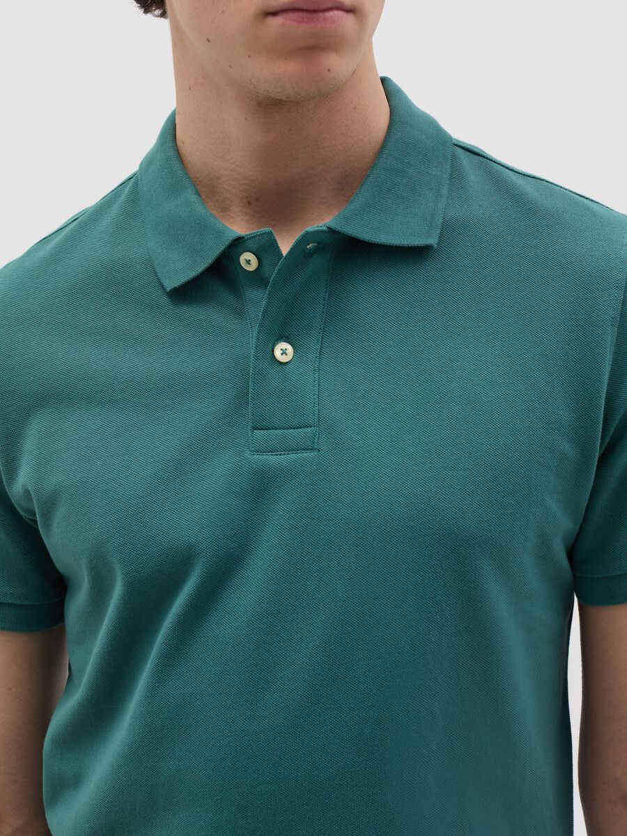 Solid colour polo shirt in organic cotton_2