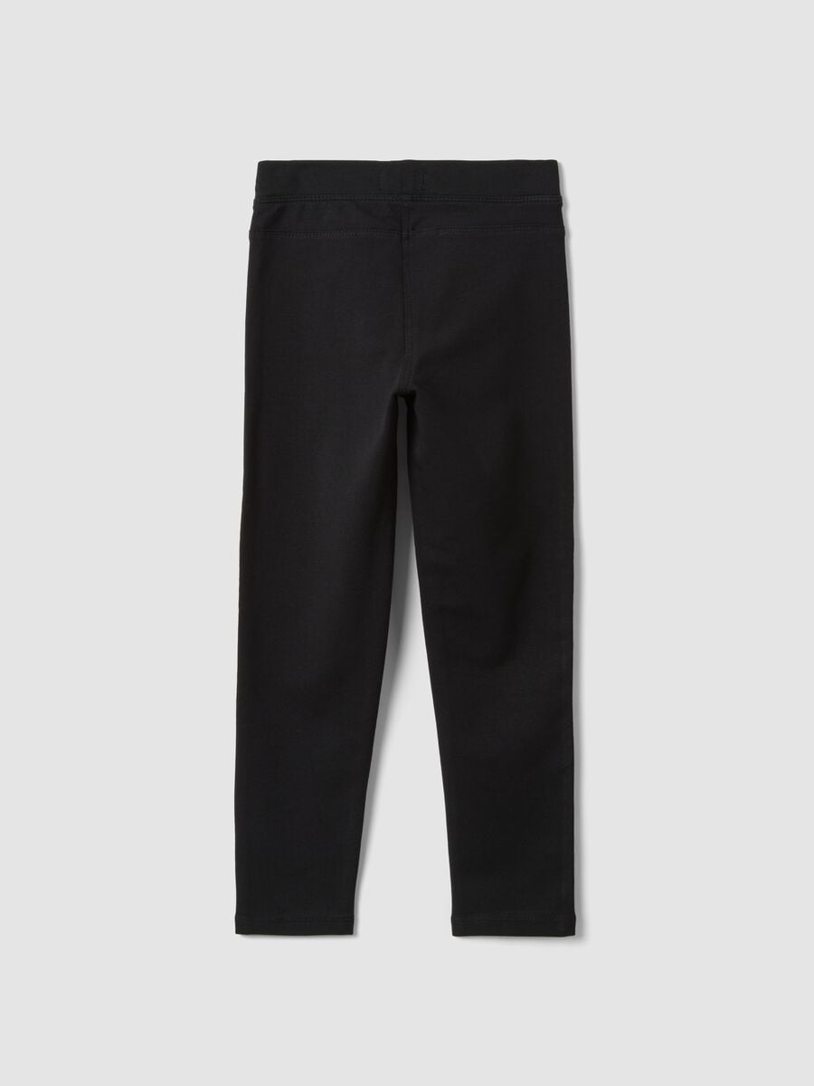 Treggings neri in cotone organico elasticizzato slim fit per bambina_1