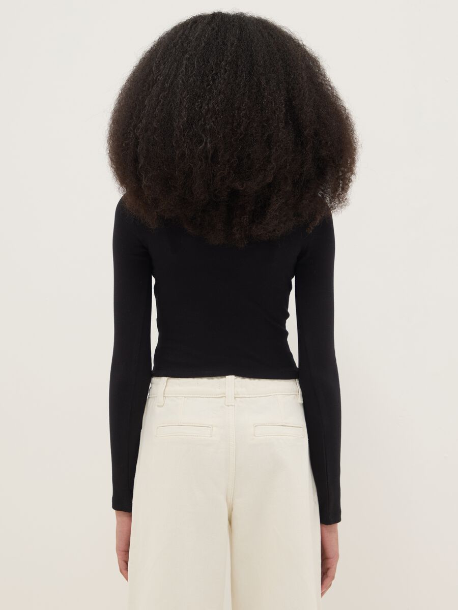 T-shirt in cotone elasticizzato nera da ragazza slim fit_1