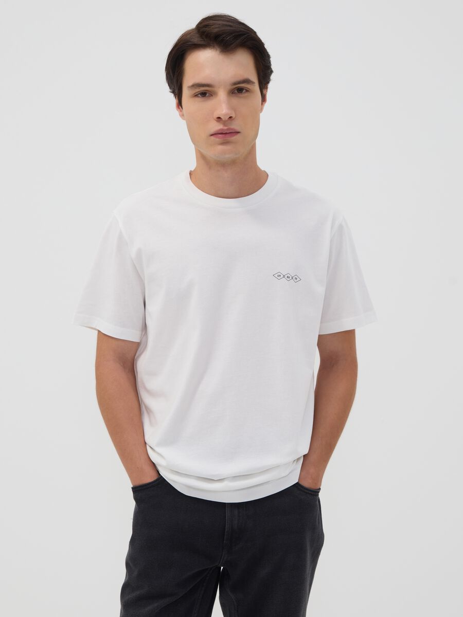 T-shirt bianca in puro cotone jersey con stampa grafica regular fit_0