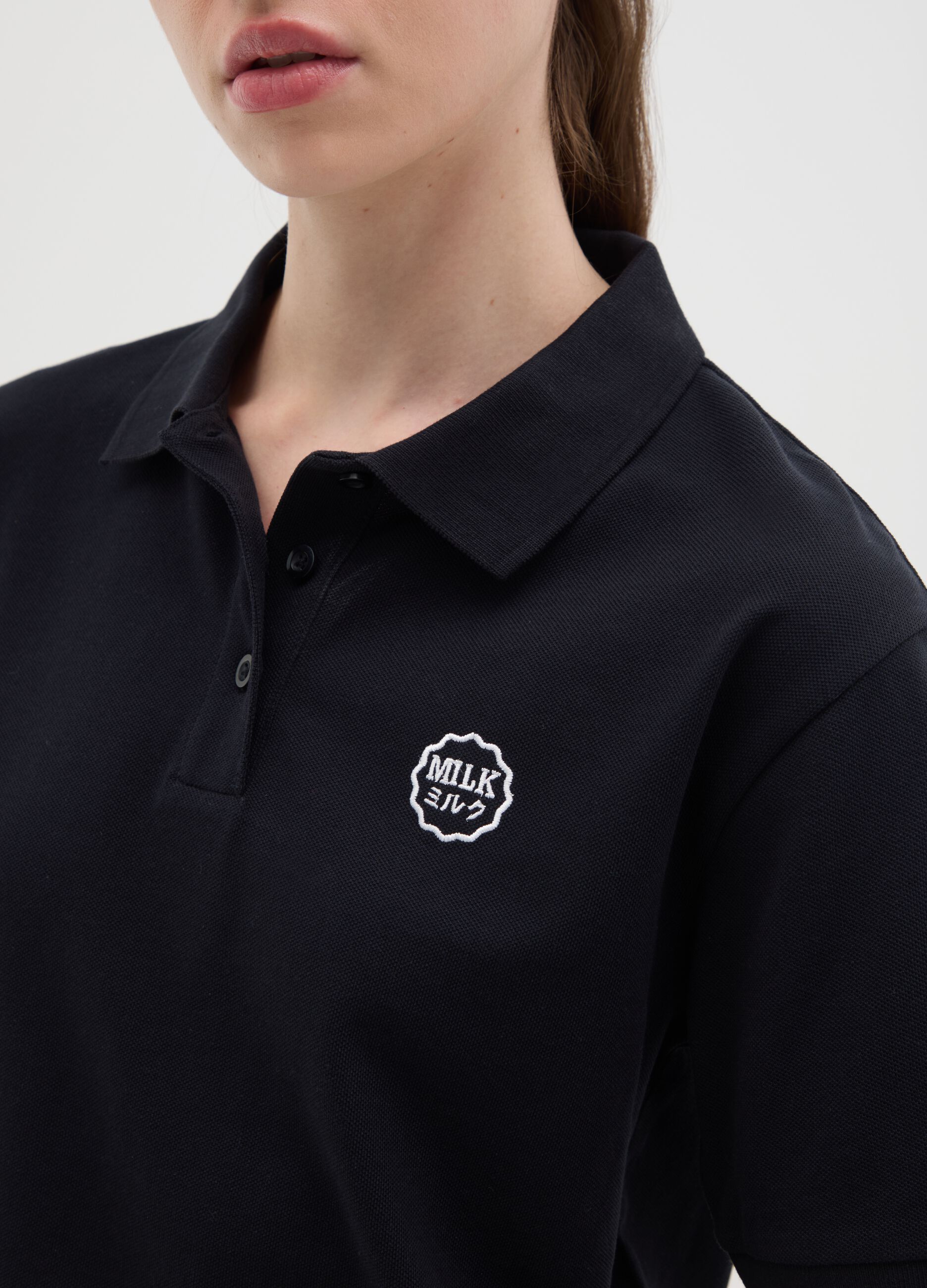Women's black pure cotton regular fit polo with classic collar and embroidered logo