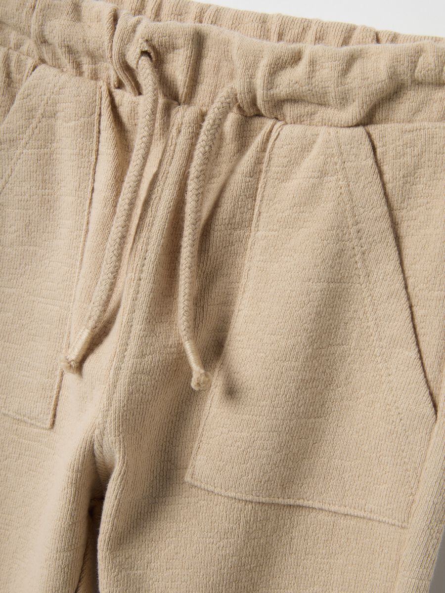 Beige regular fit pure cotton trousers_2