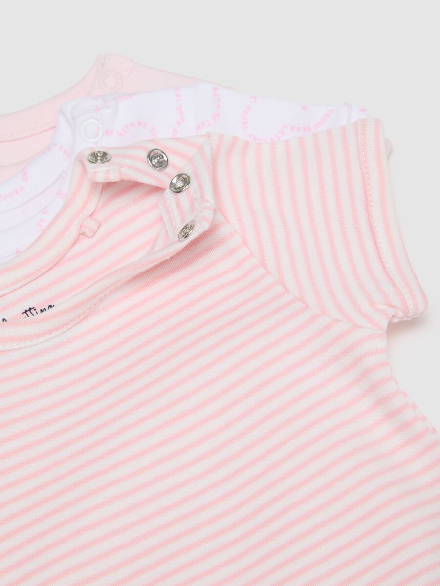 Set of three baby girl cotton bodysuits in multicolour_3