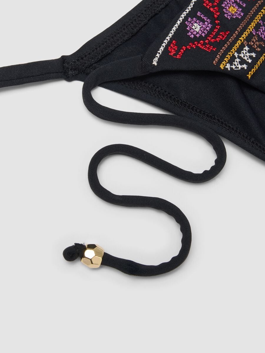 Slip bikini nero in tessuto elasticizzato con laccetti_5