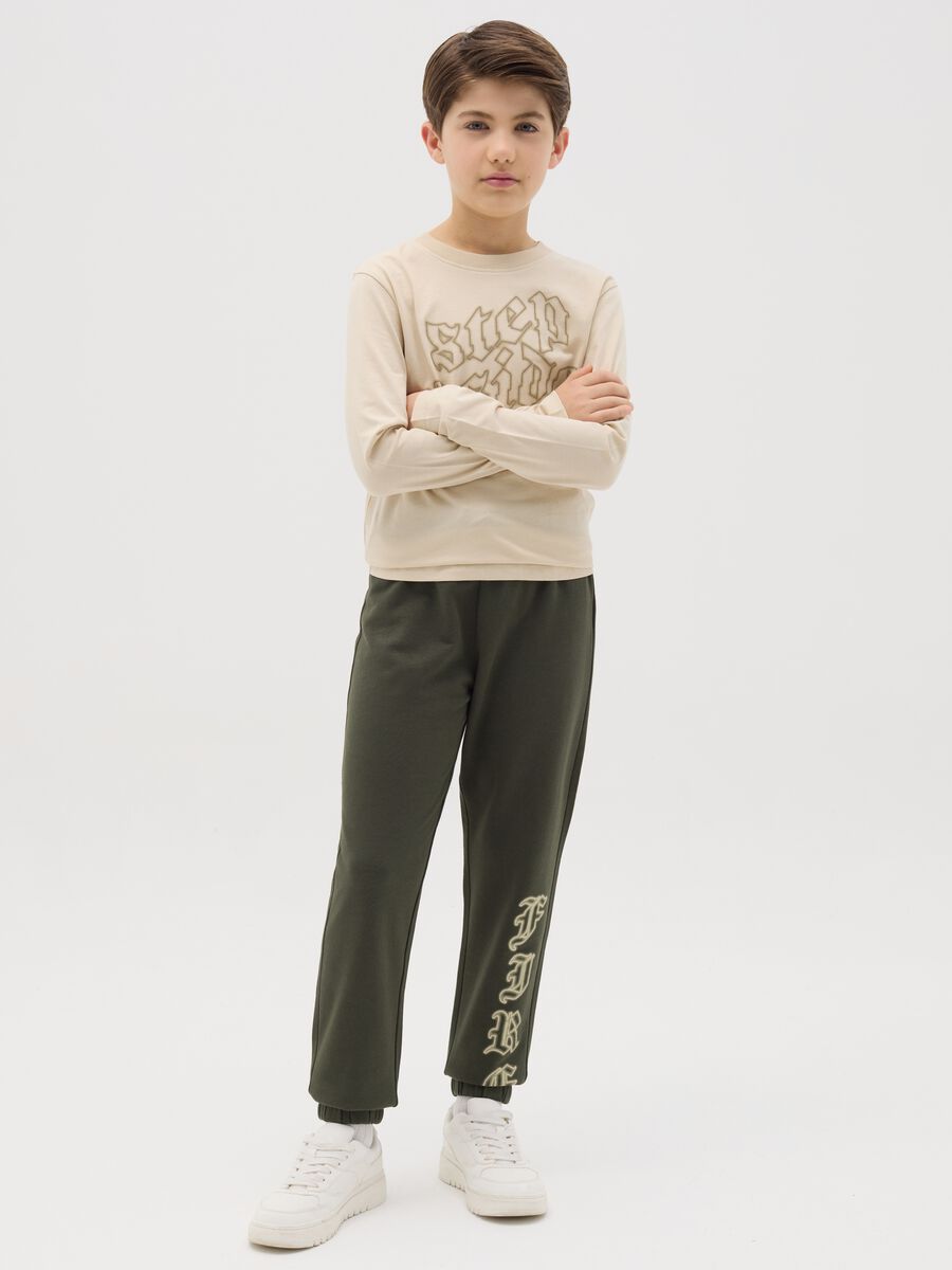 Joggers with drawstring and "Fire" print_1