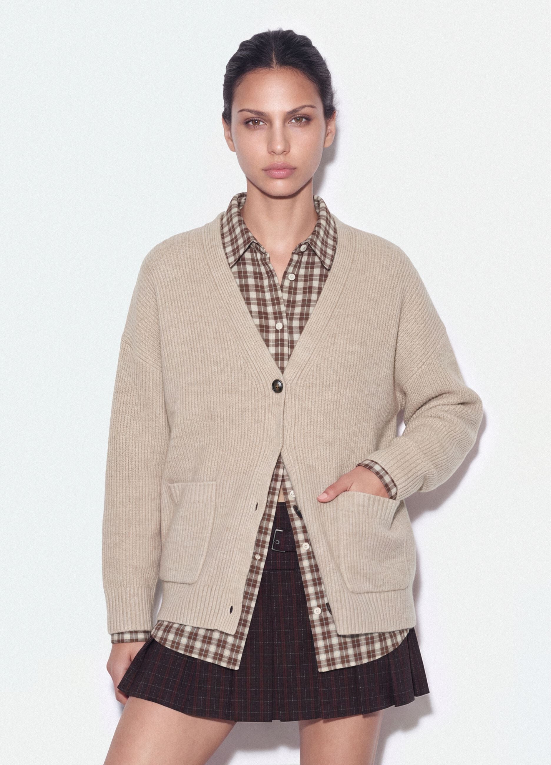 Beige stretch-fabric cardigan with deep V-neck