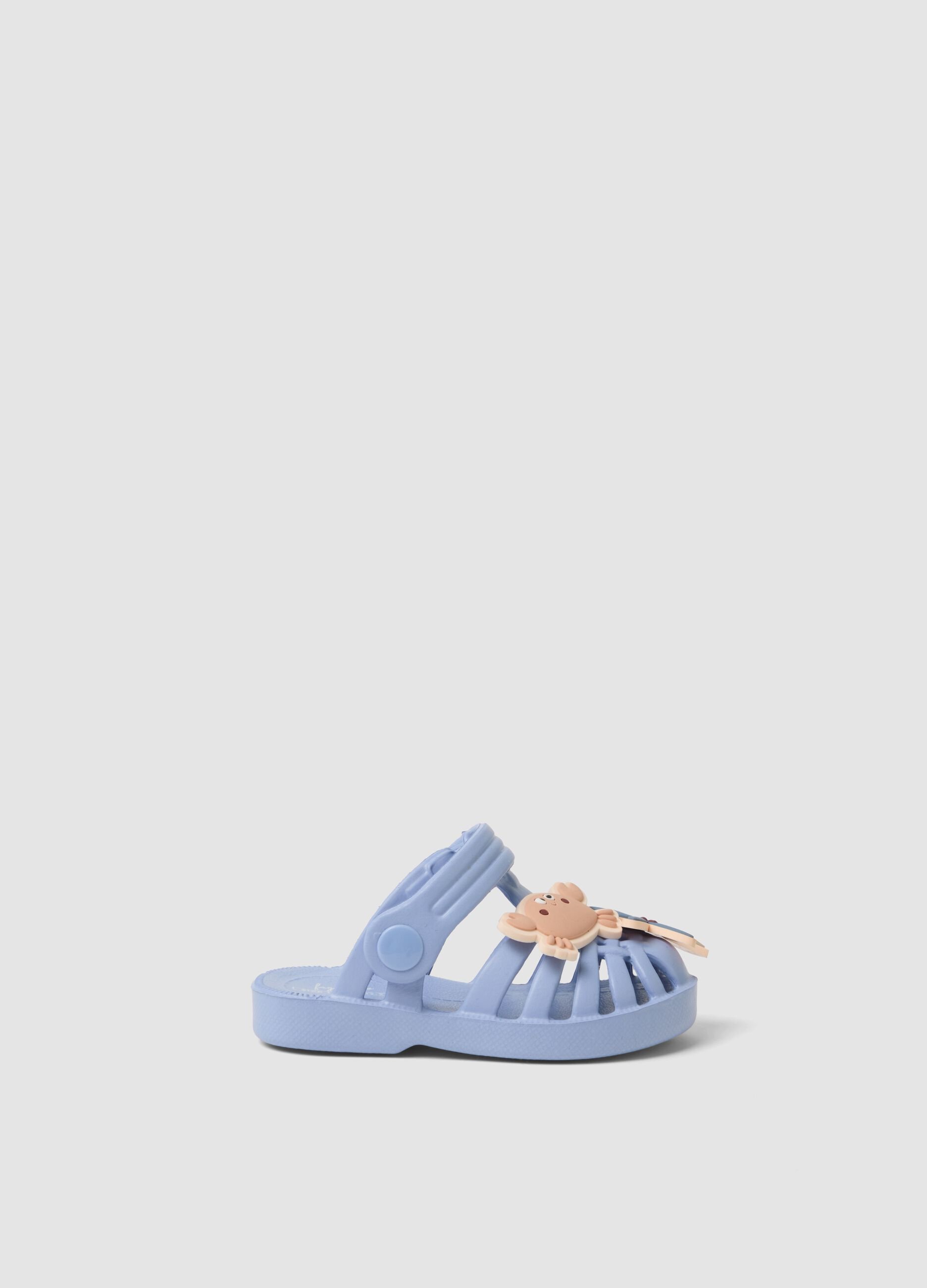 Baby blue sandals with decorative appliqu&eacute;s
