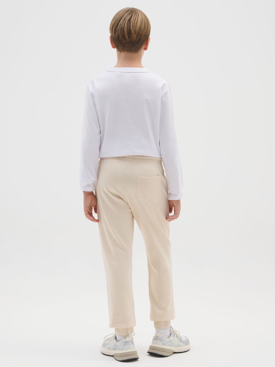 Pantaloni jogger da ragazzo in puro cotone beige regular fit_1