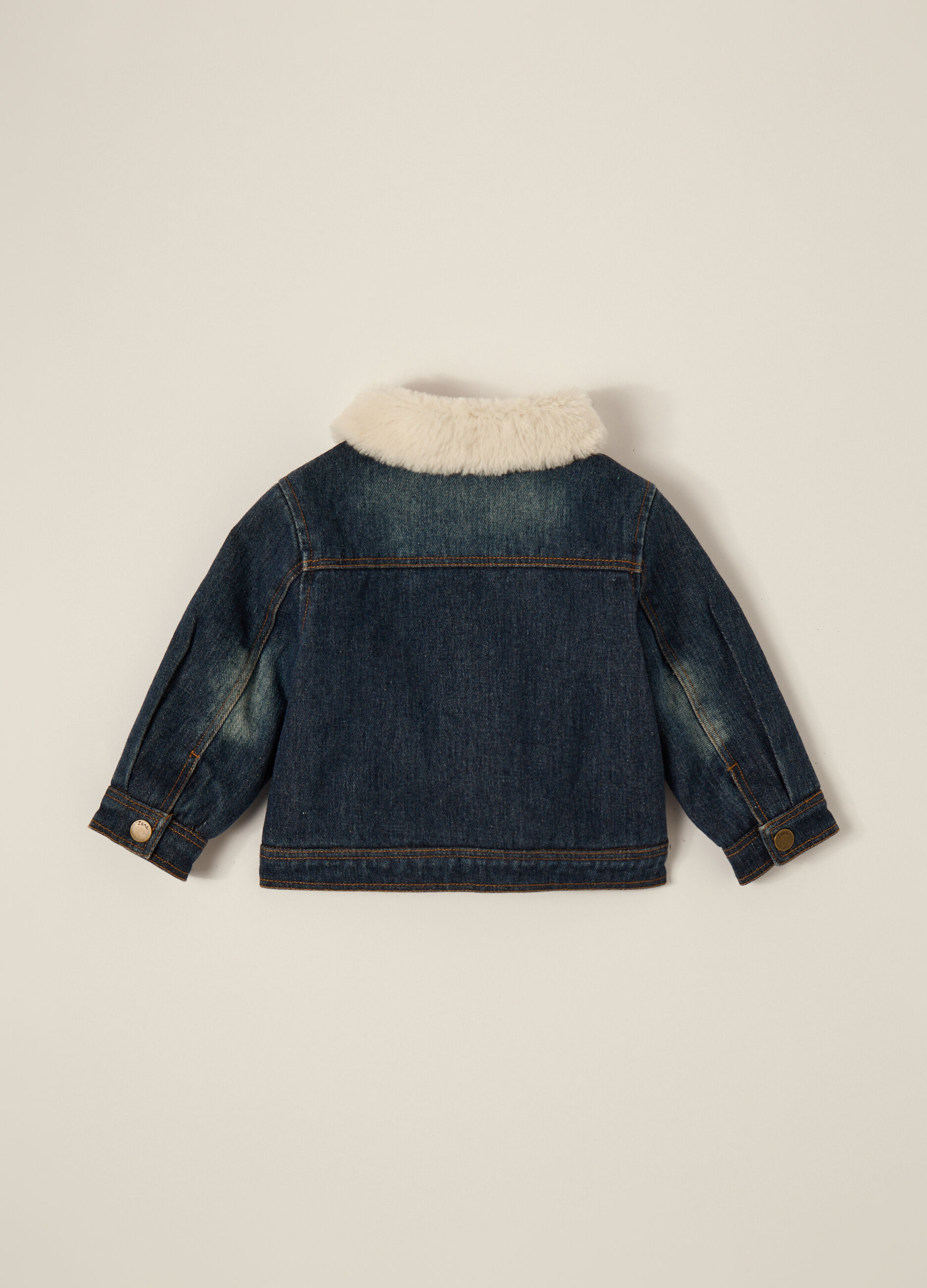 Blue denim jacket with fur lining