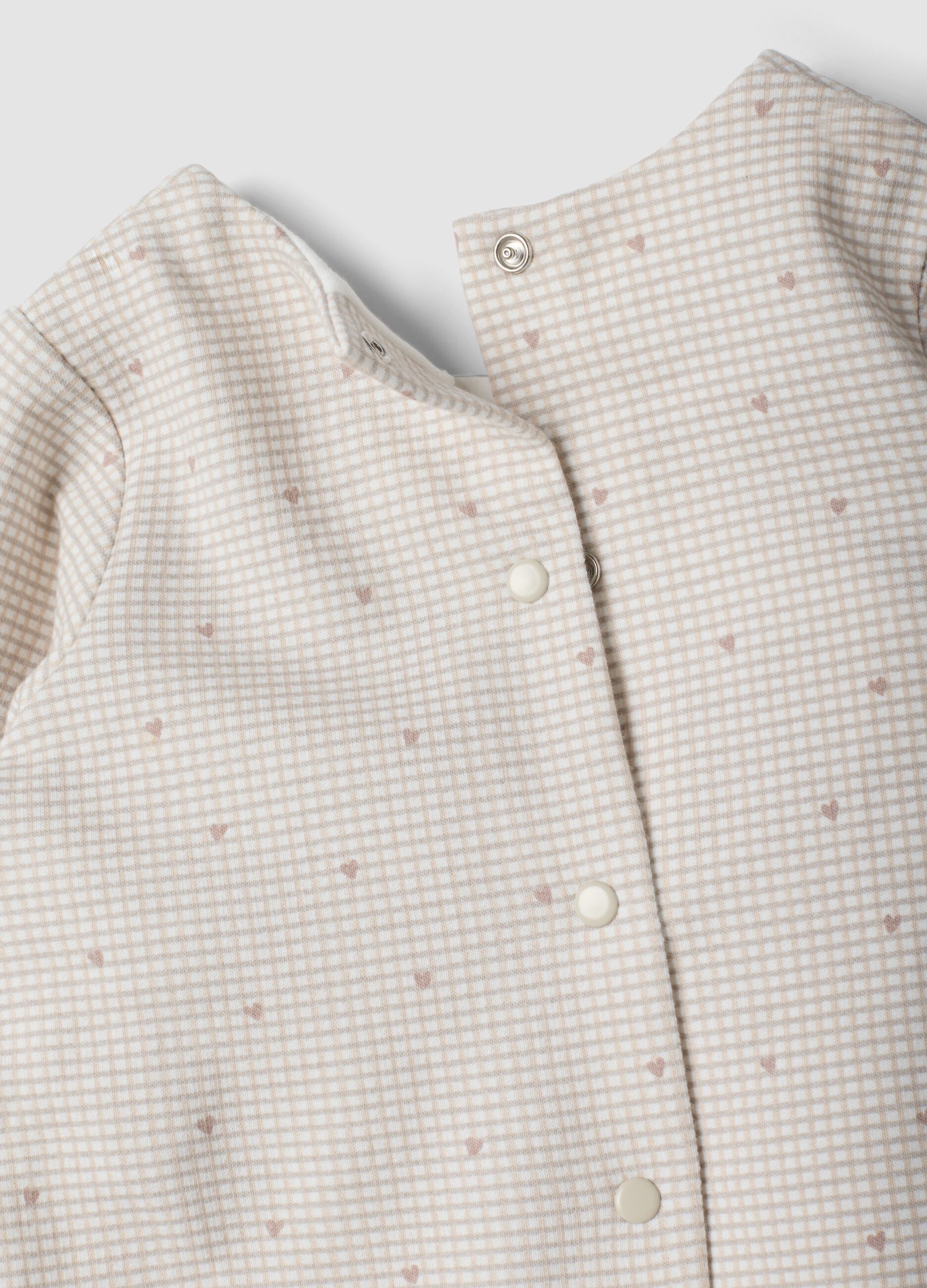 White pure organic cotton baby sleepsuit with gingham print