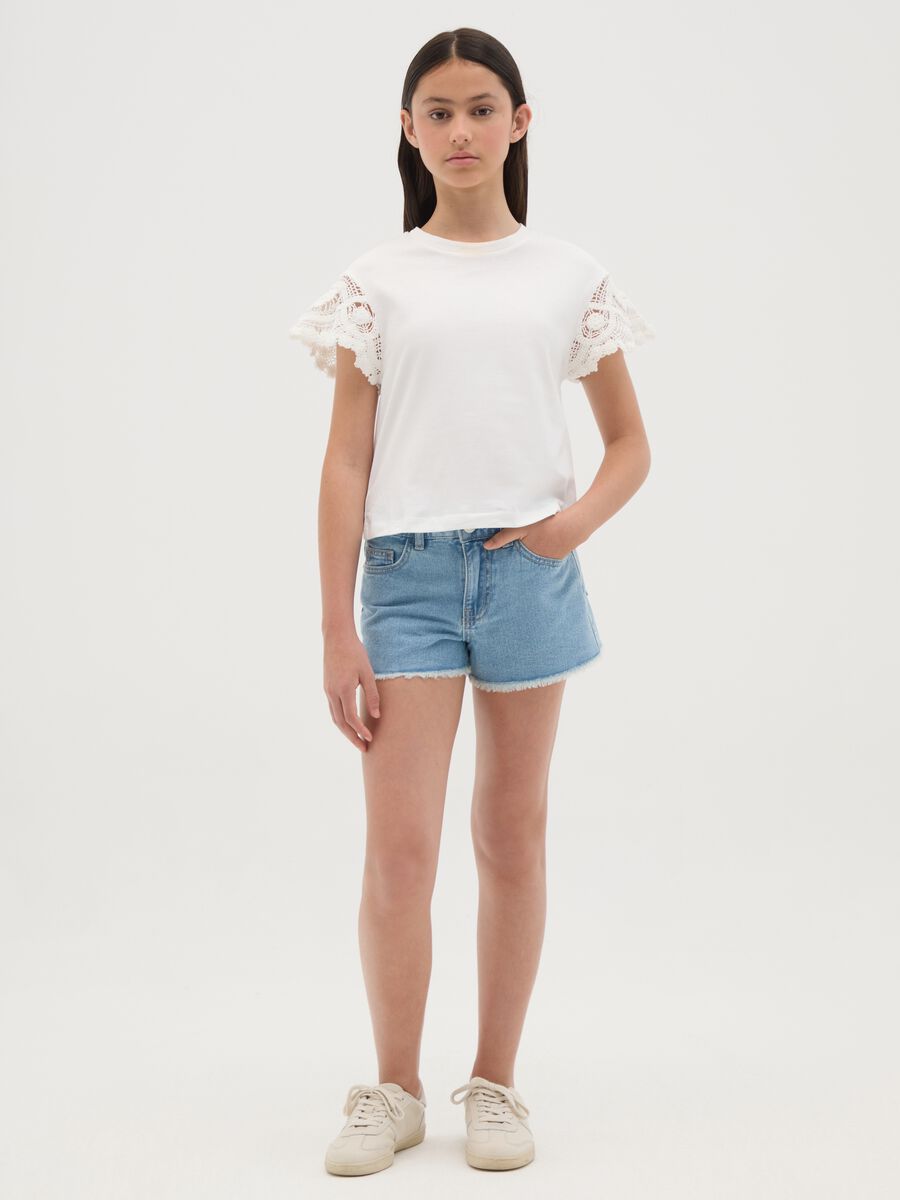 Blue denim shorts with bow details at the back_1