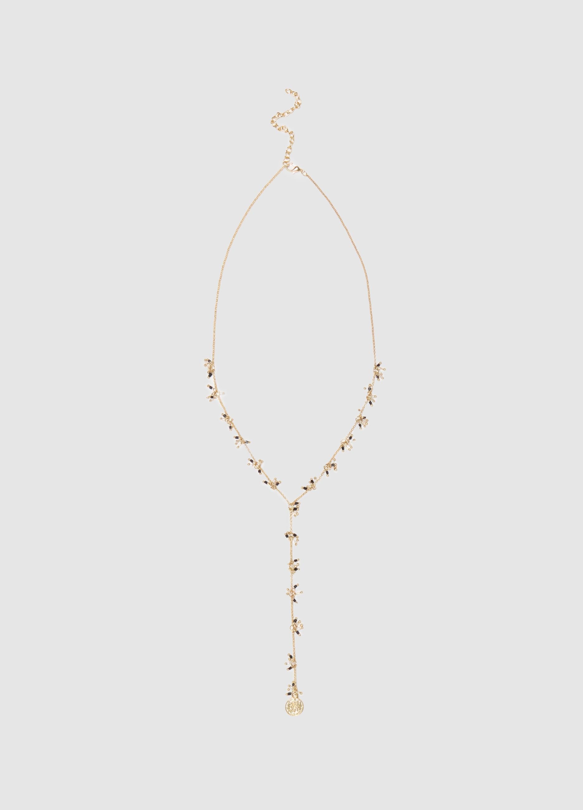 Collana lunga con pendenti di perline