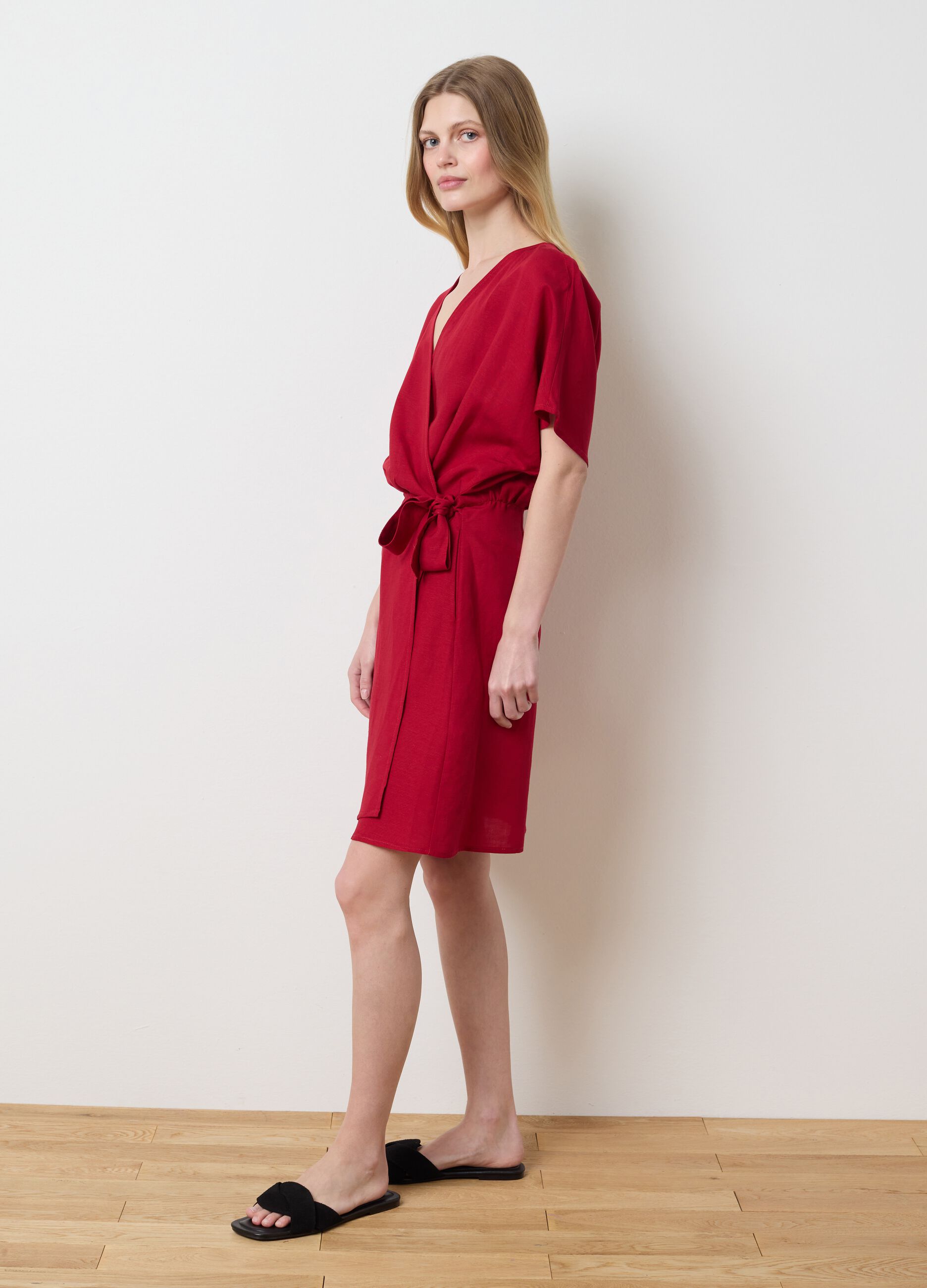 Short red wraparound dress