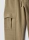 Pantaloni jogger in misto cotone beige da bambino regular fit con elastico_3