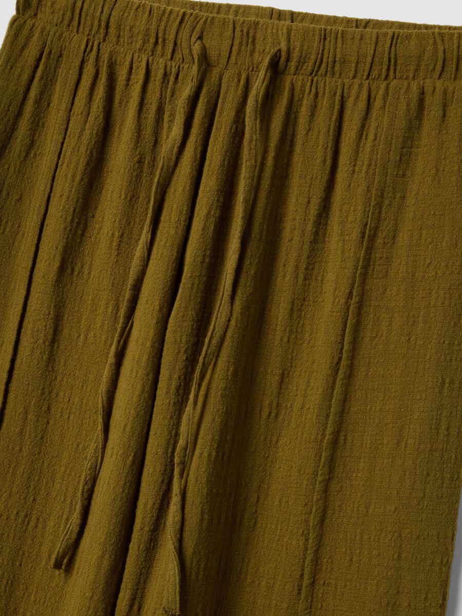 Pantaloni verdi da mare in puro cotone_1