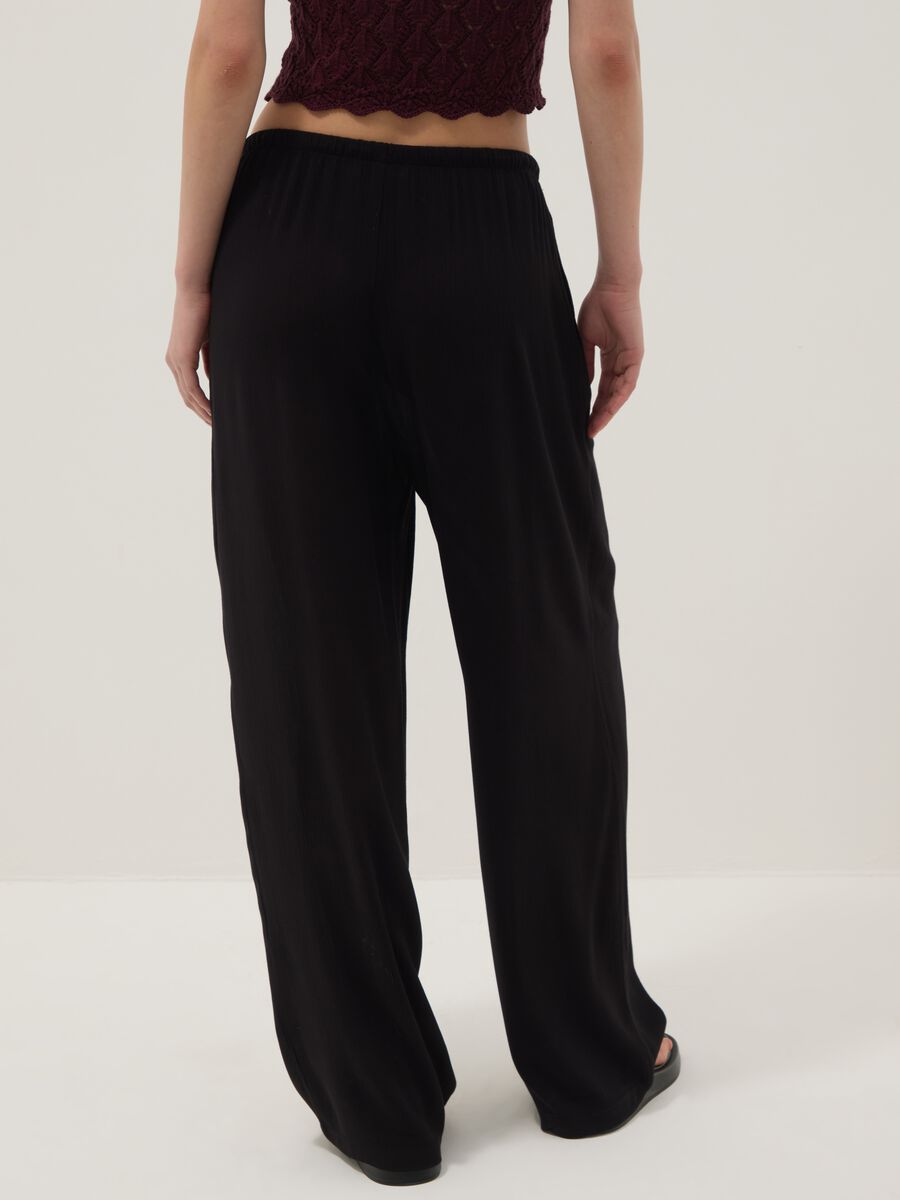 Black palazzo trousers in pure viscose_2