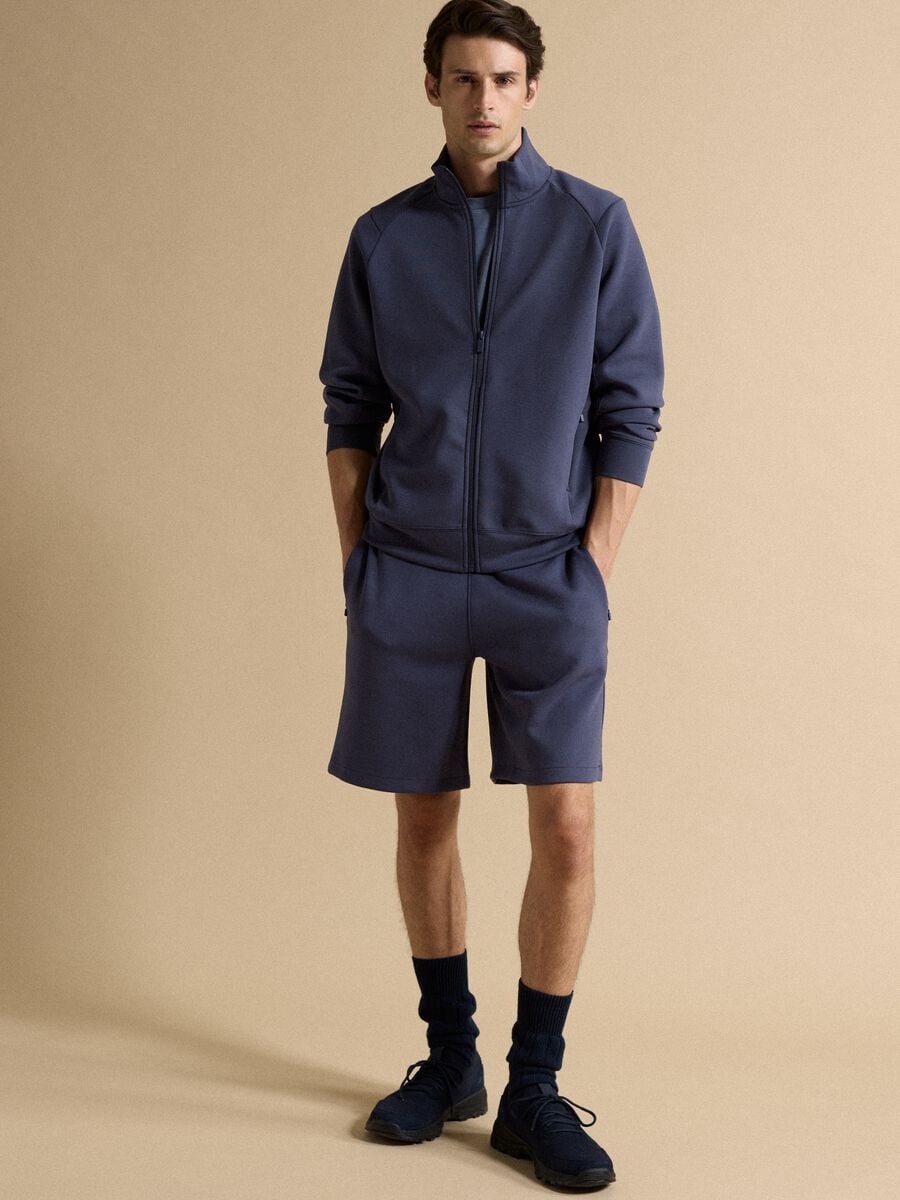 Full-zip blu con colletto in tessuto elasticizzato Easy Dry regular fit_1