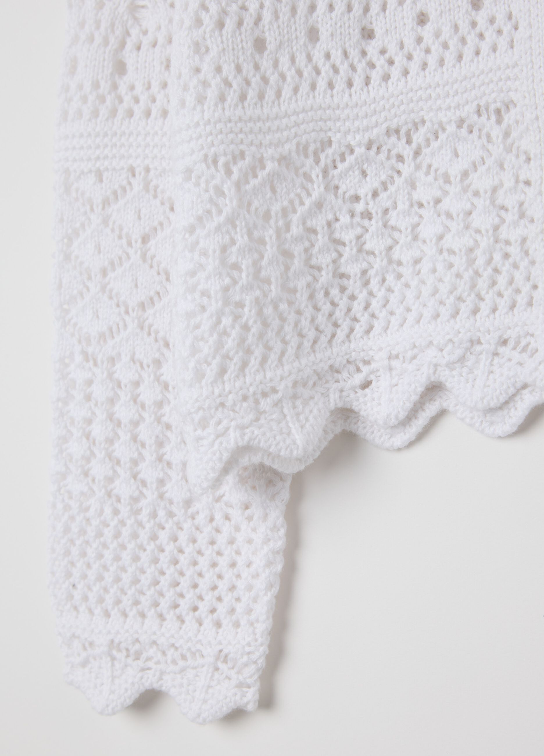 White cardigan with openwork design