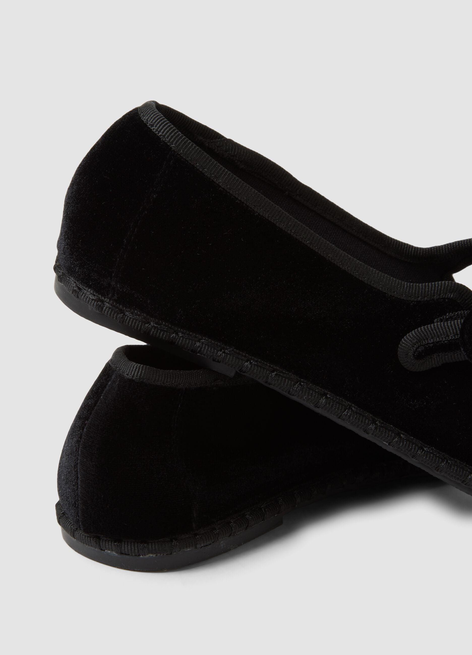 Black ballet flats with strap