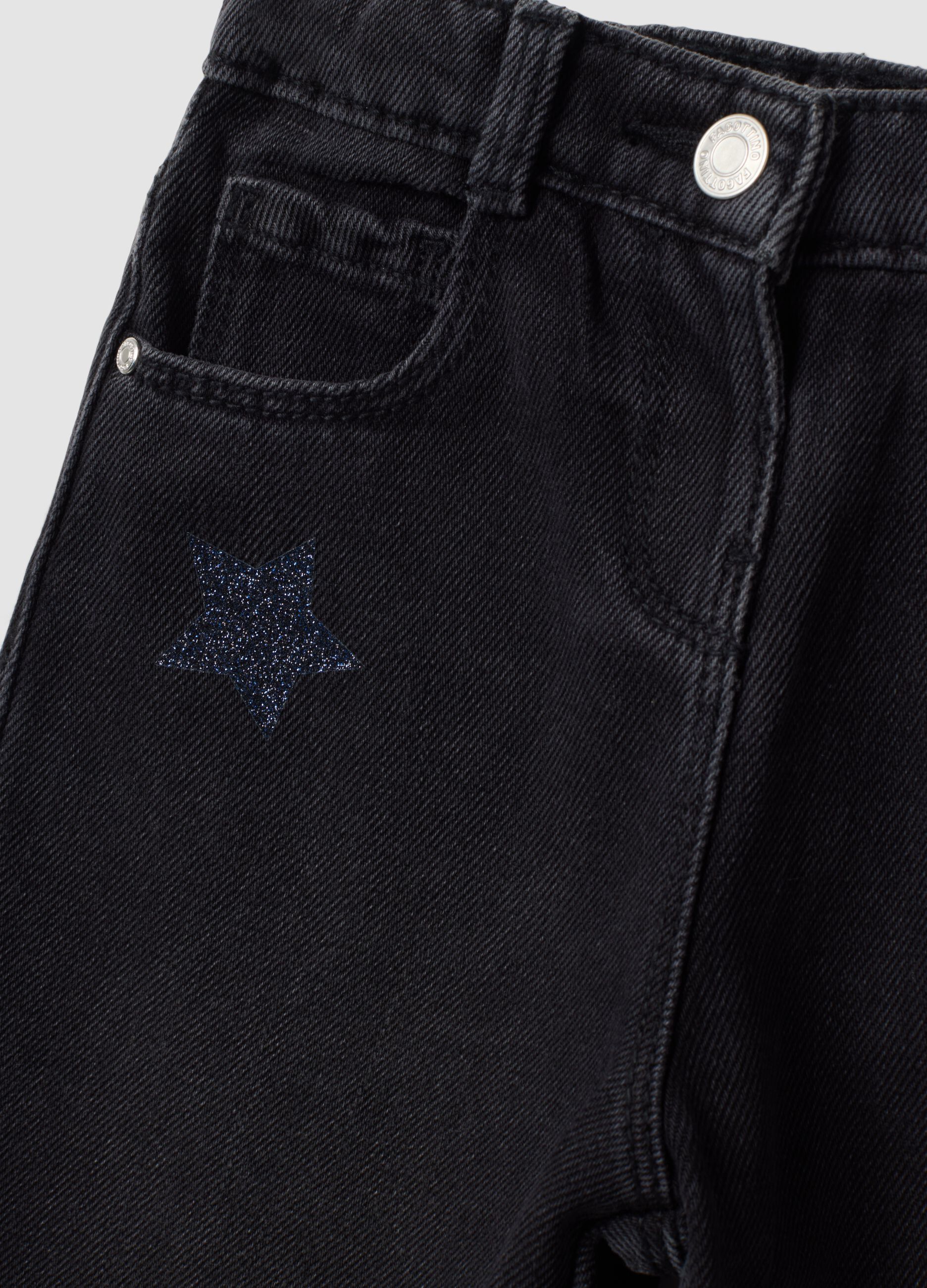 Black balloon-fit jeans in cotton and viscose blend with star print for baby girl