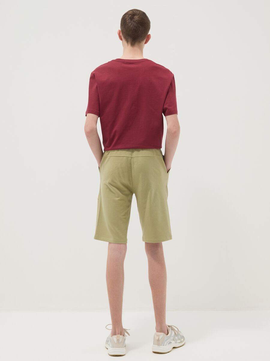 Shorts jogger verdi in puro cotone da ragazzo con vita elasticizzata_1