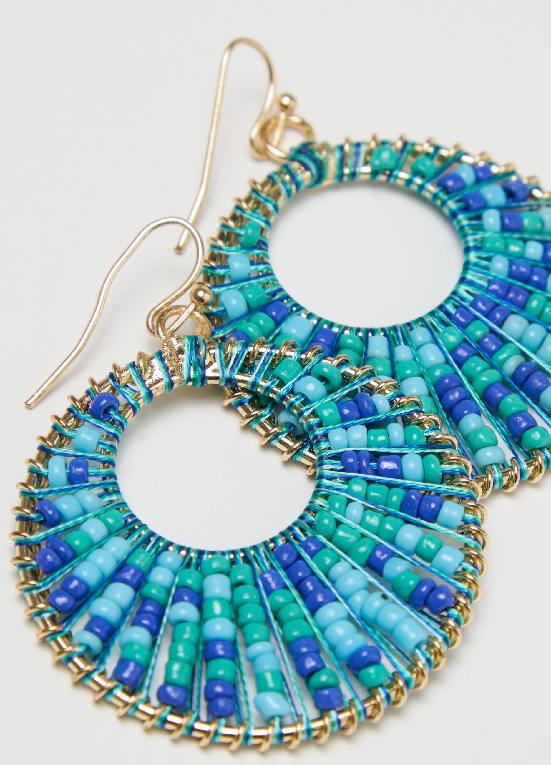 Hoop earrings with light blue and green beads