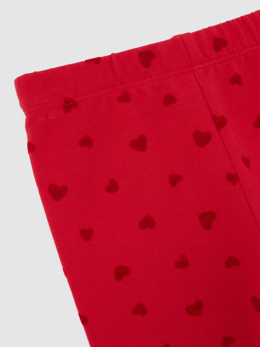 Red leggings for girls in stretch cotton with heart prints_2