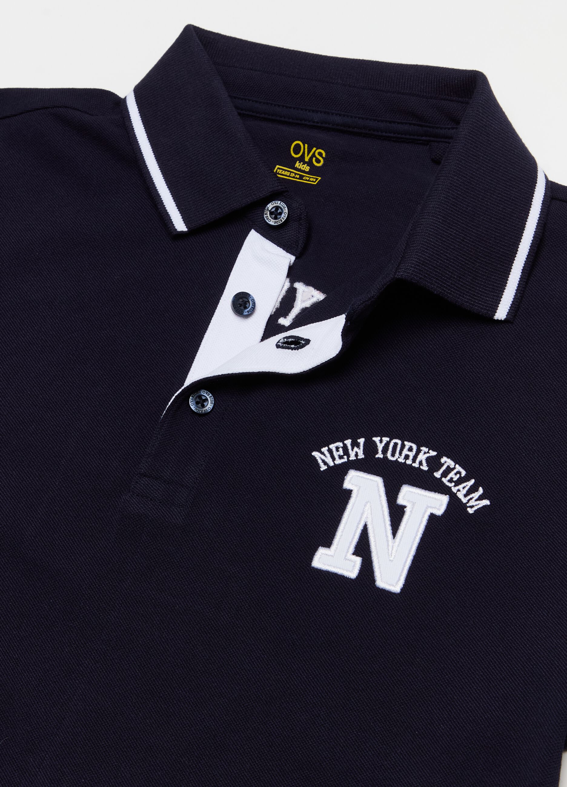 Piquet polo shirt with patch and lettering embroidery