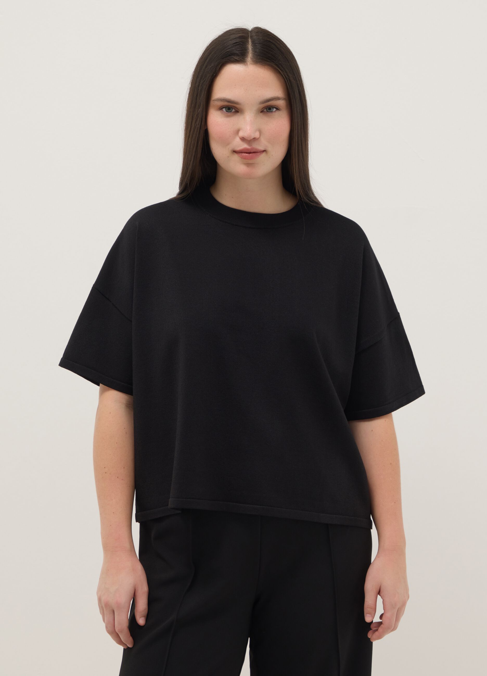 Black oversized crop top with round neckline