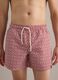 Red swim shorts with geometric print_1