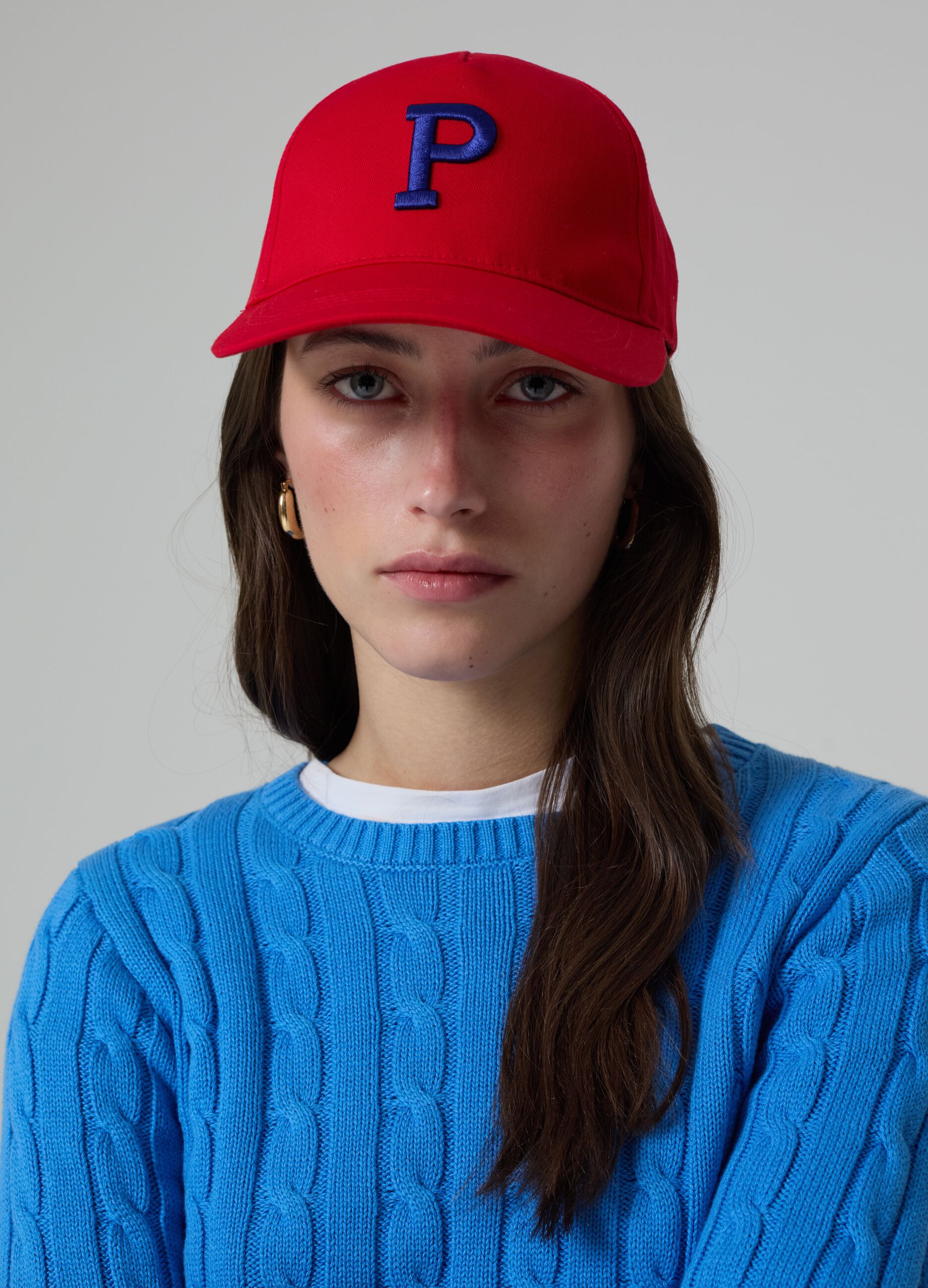 Ribbed pullover with cable-knit design