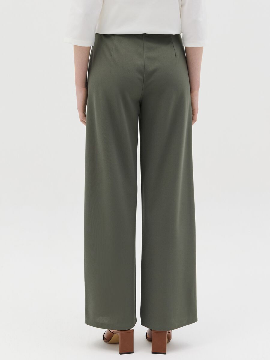 Green palazzo trousers with pockets_3