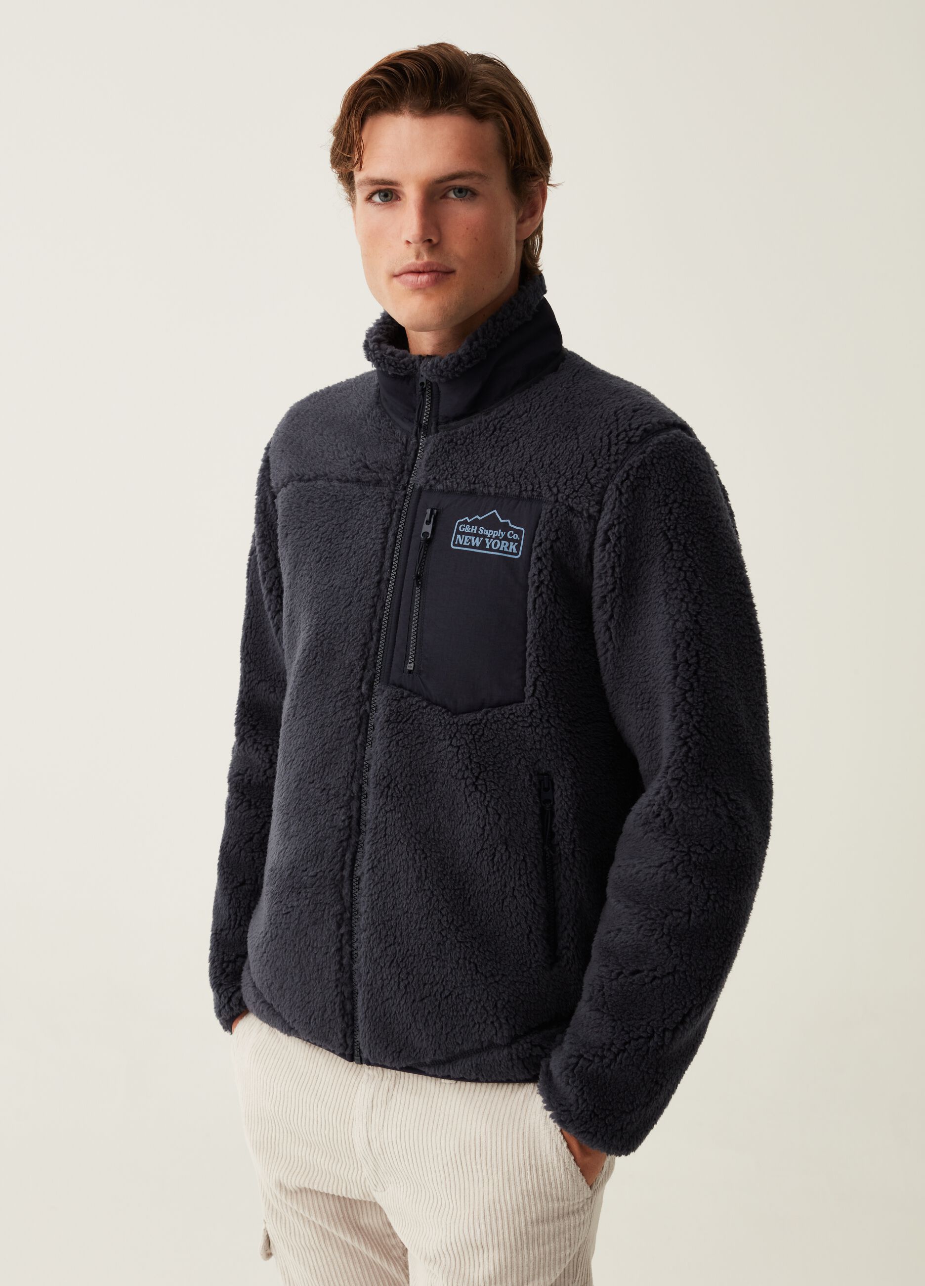 Full-zip in sherpa con tasche_1