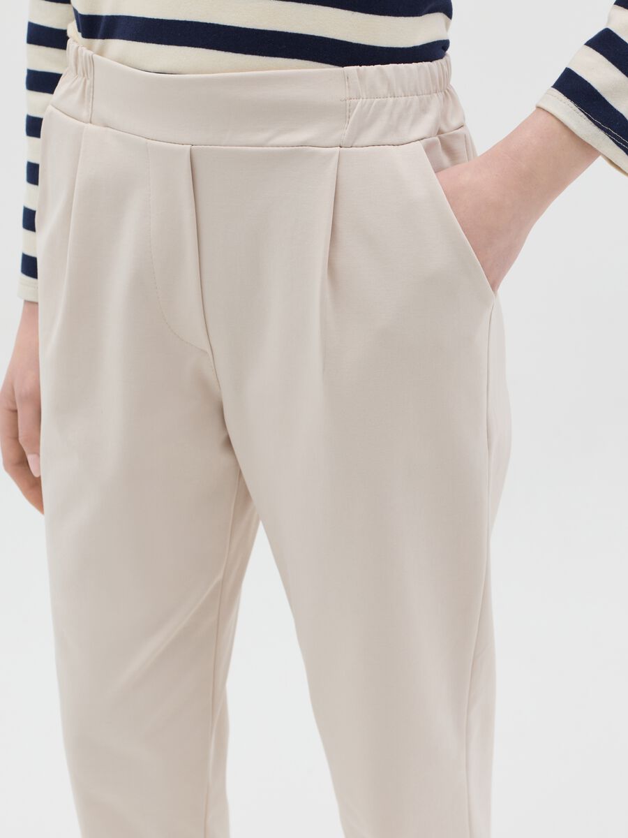 Beige cropped trousers with turn-ups_2