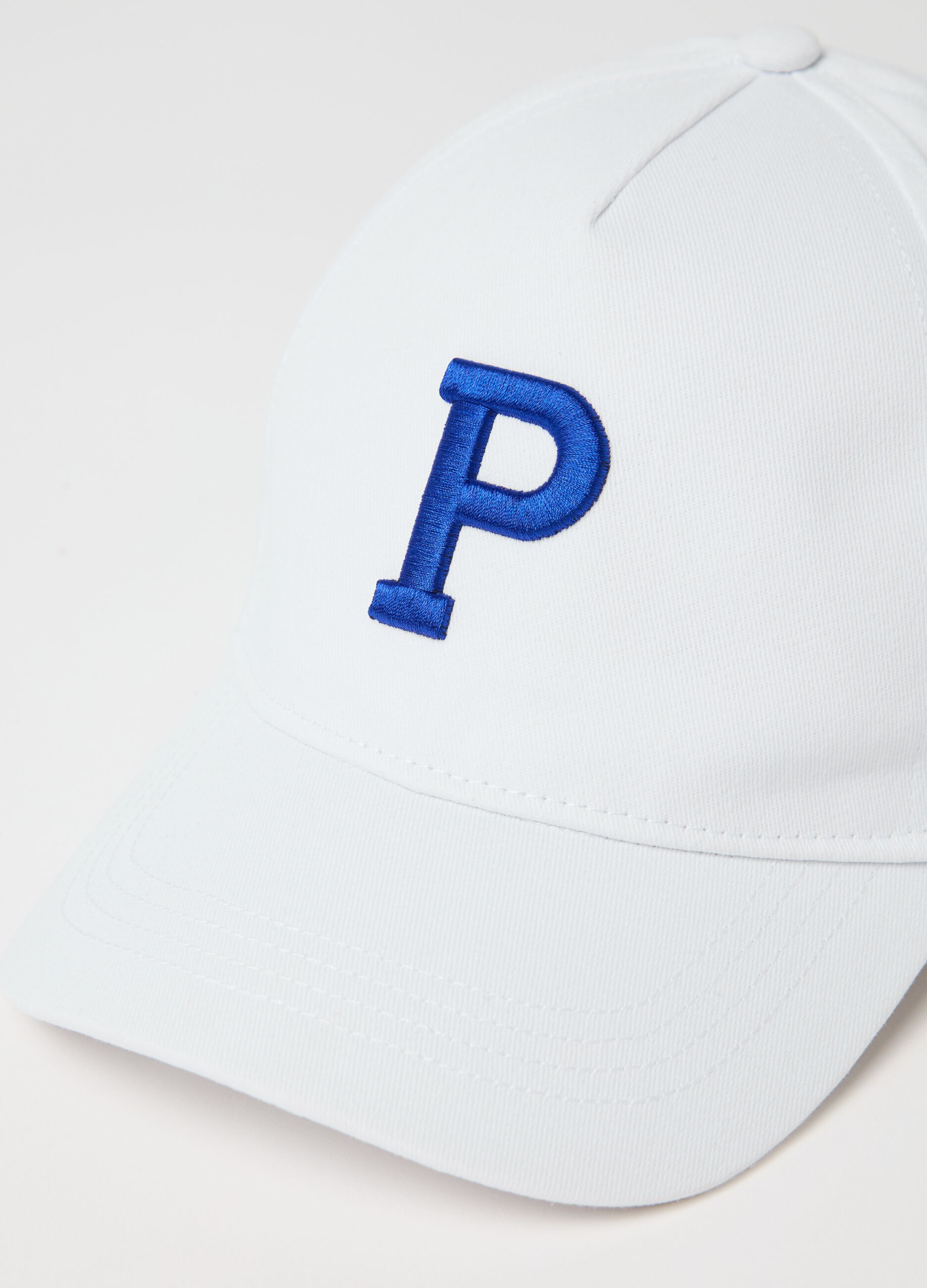 White baseball cap with logo embroidery