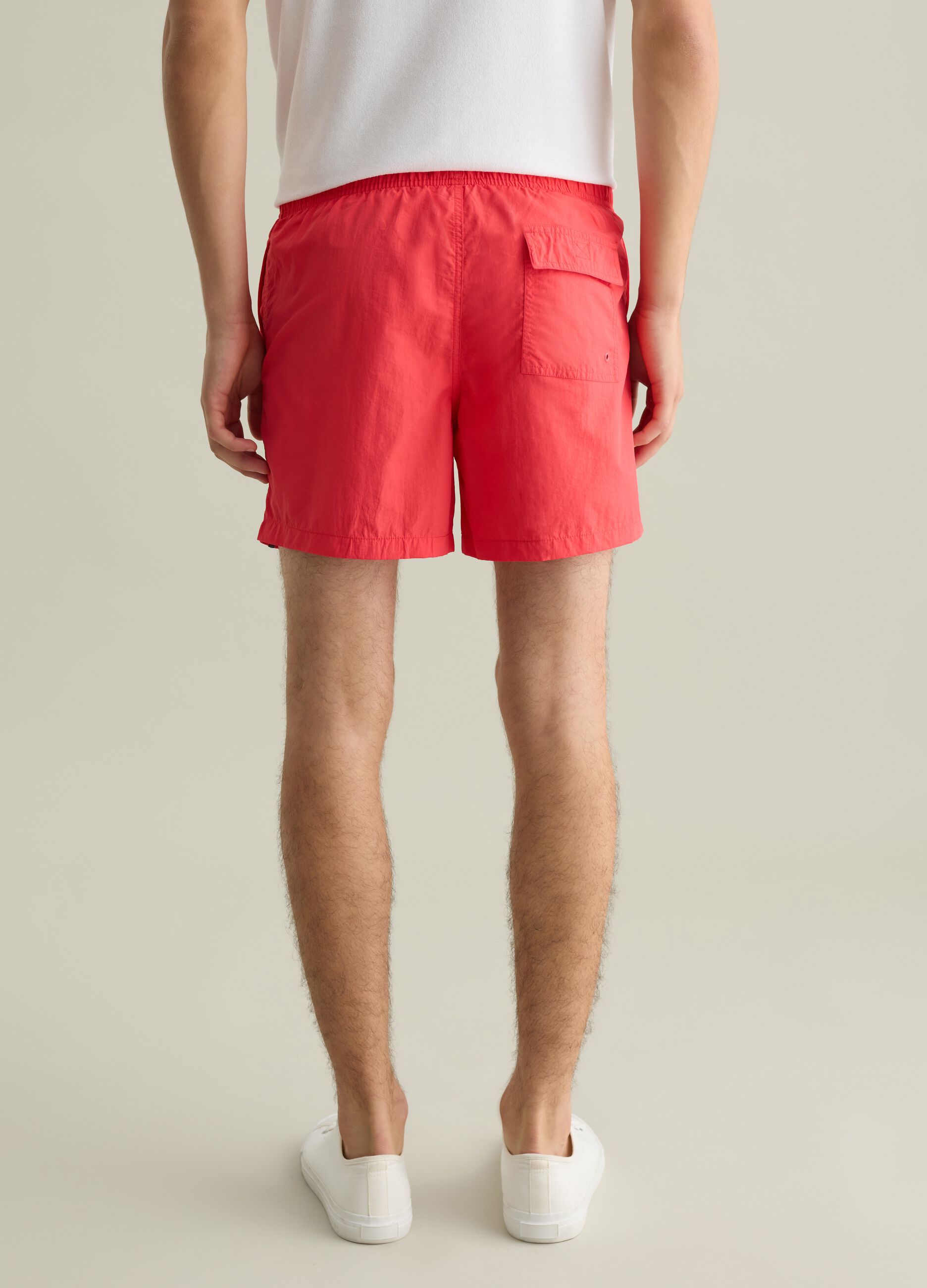Men’s regular-fit swim boxers in red blend with elastic waist