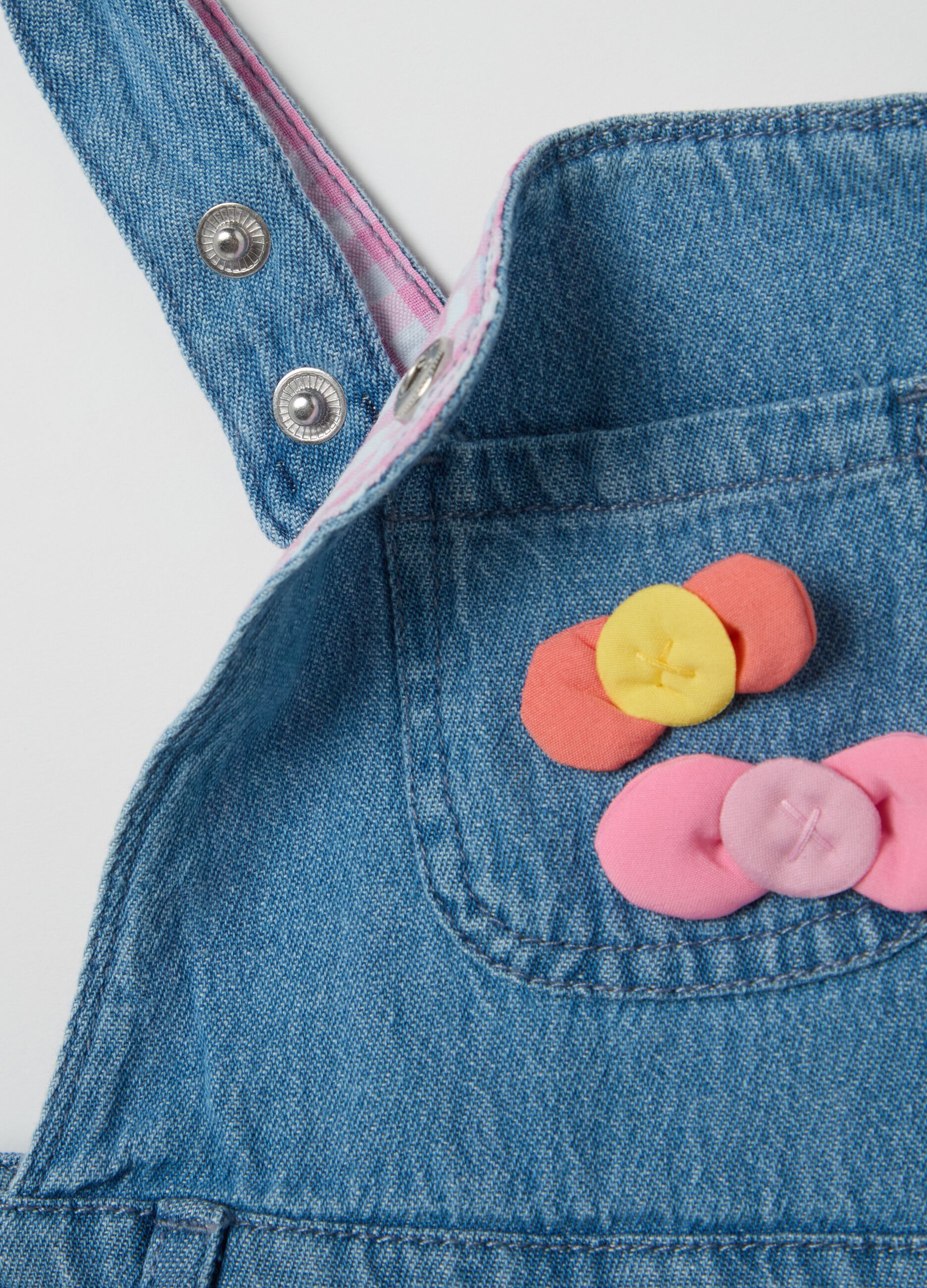 Denim dungarees with bows application