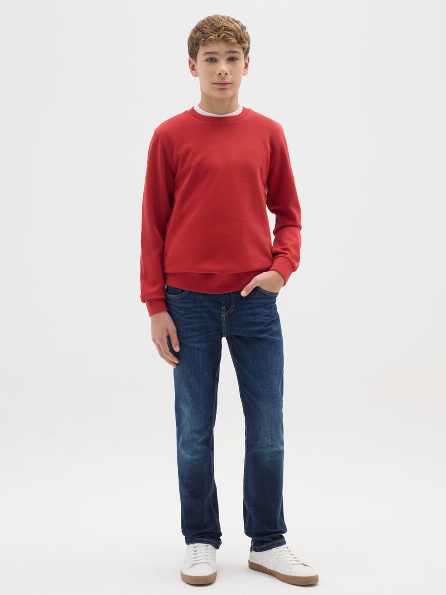 Jeans blu da ragazzo in denim elasticizzato regular fit_0