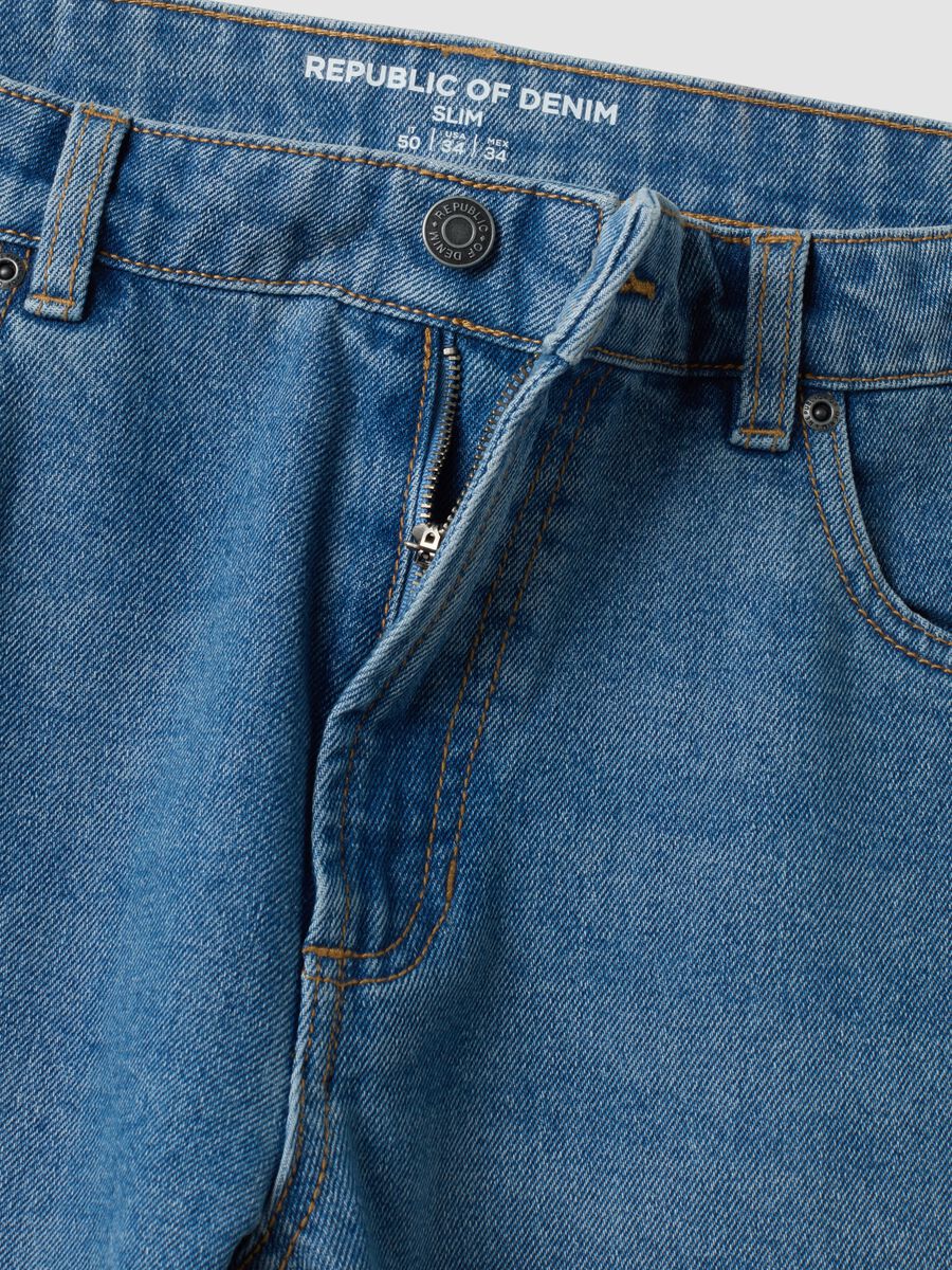 Light blue cotton and viscose blend slim-fit jeans_1