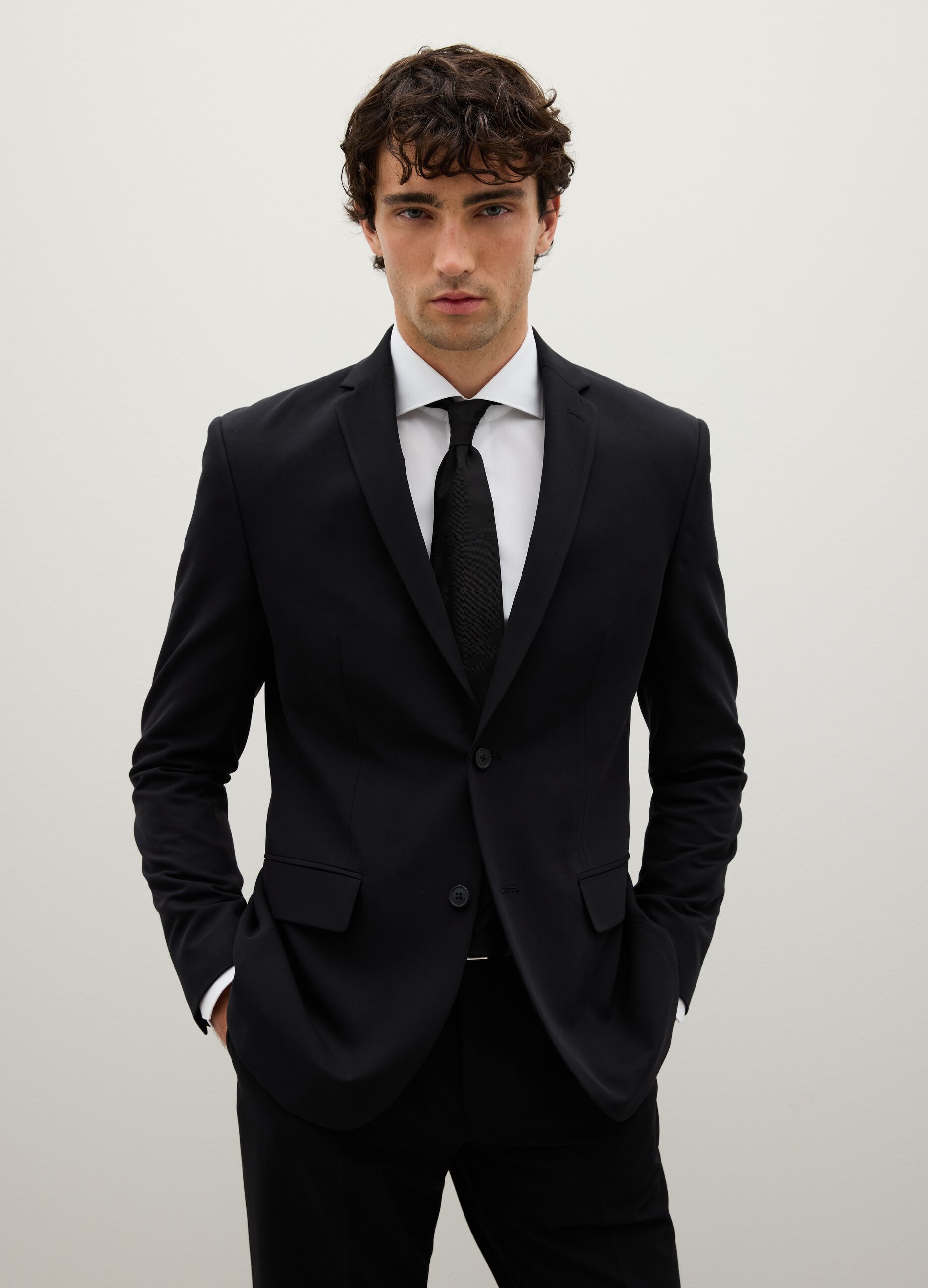 Black slim fit blazer with button closure