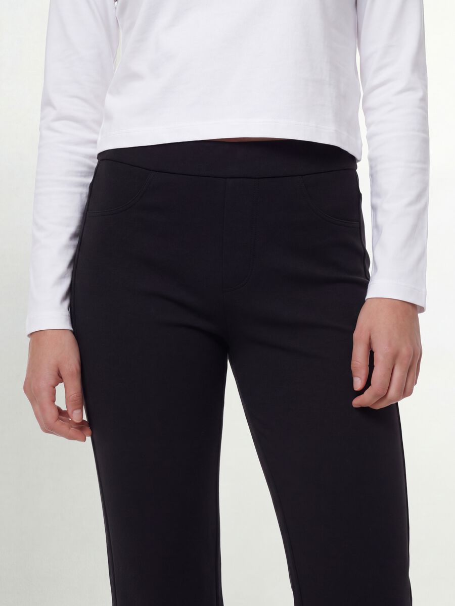 Pantaloni neri in cotone organico elasticizzato slim fit per ragazza_3
