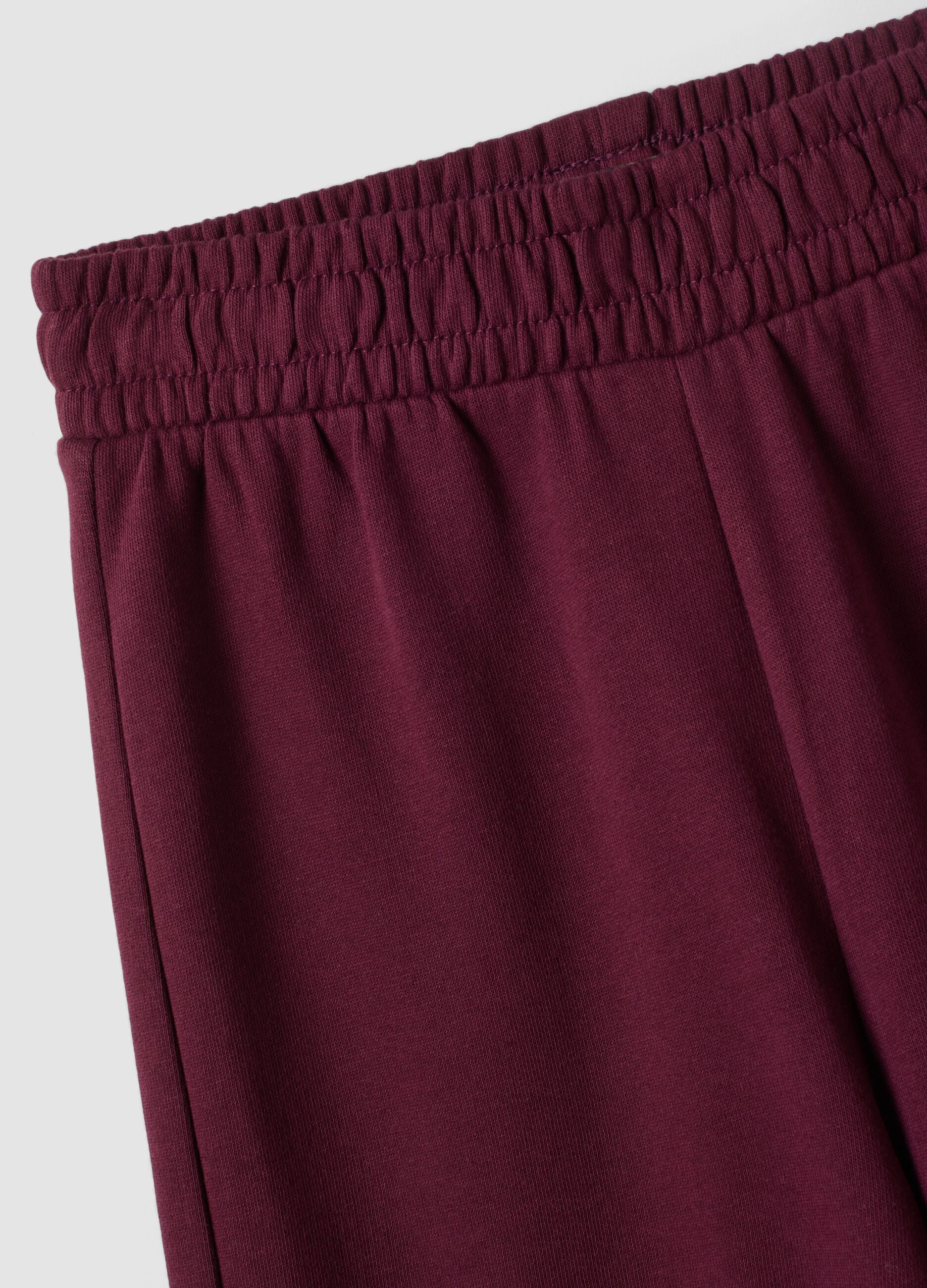 Pantaloni viola in puro cotone wide leg con tasche cargo