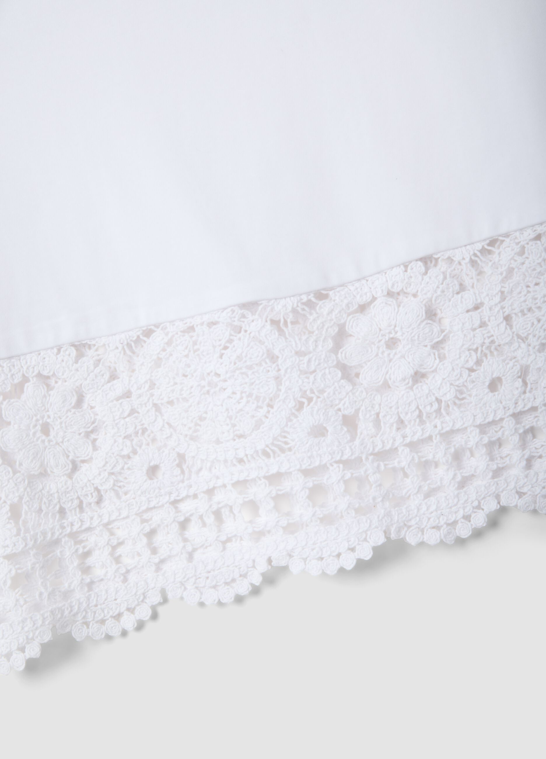 White cotton-blend vest top with lace detailing