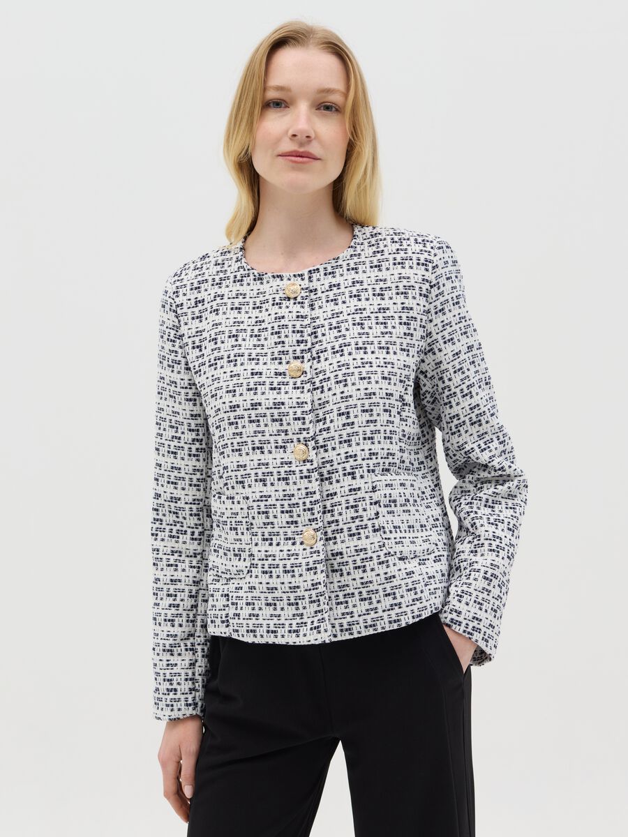 Short black and white jacket in tweed_0