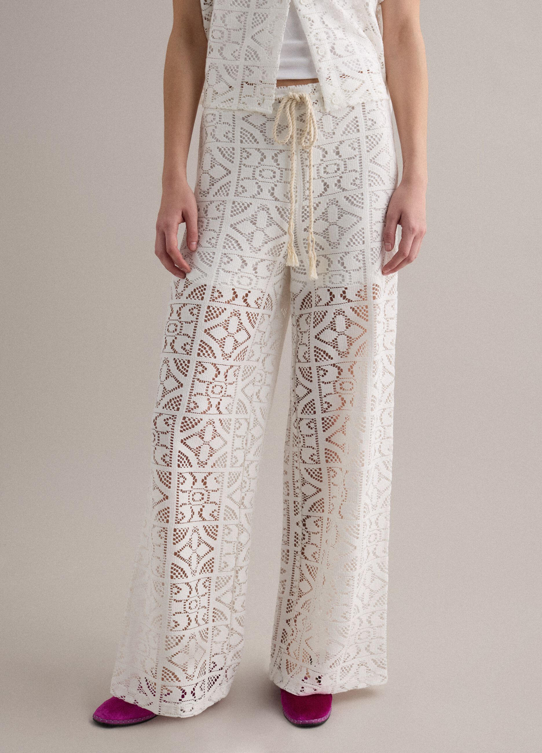 White openwork wide-leg trousers with elasticated waistband