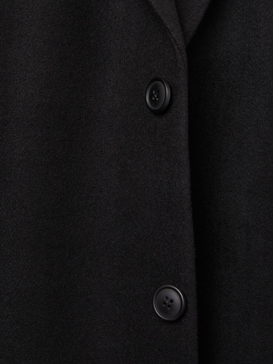 Long single-breasted solid colour coat_2