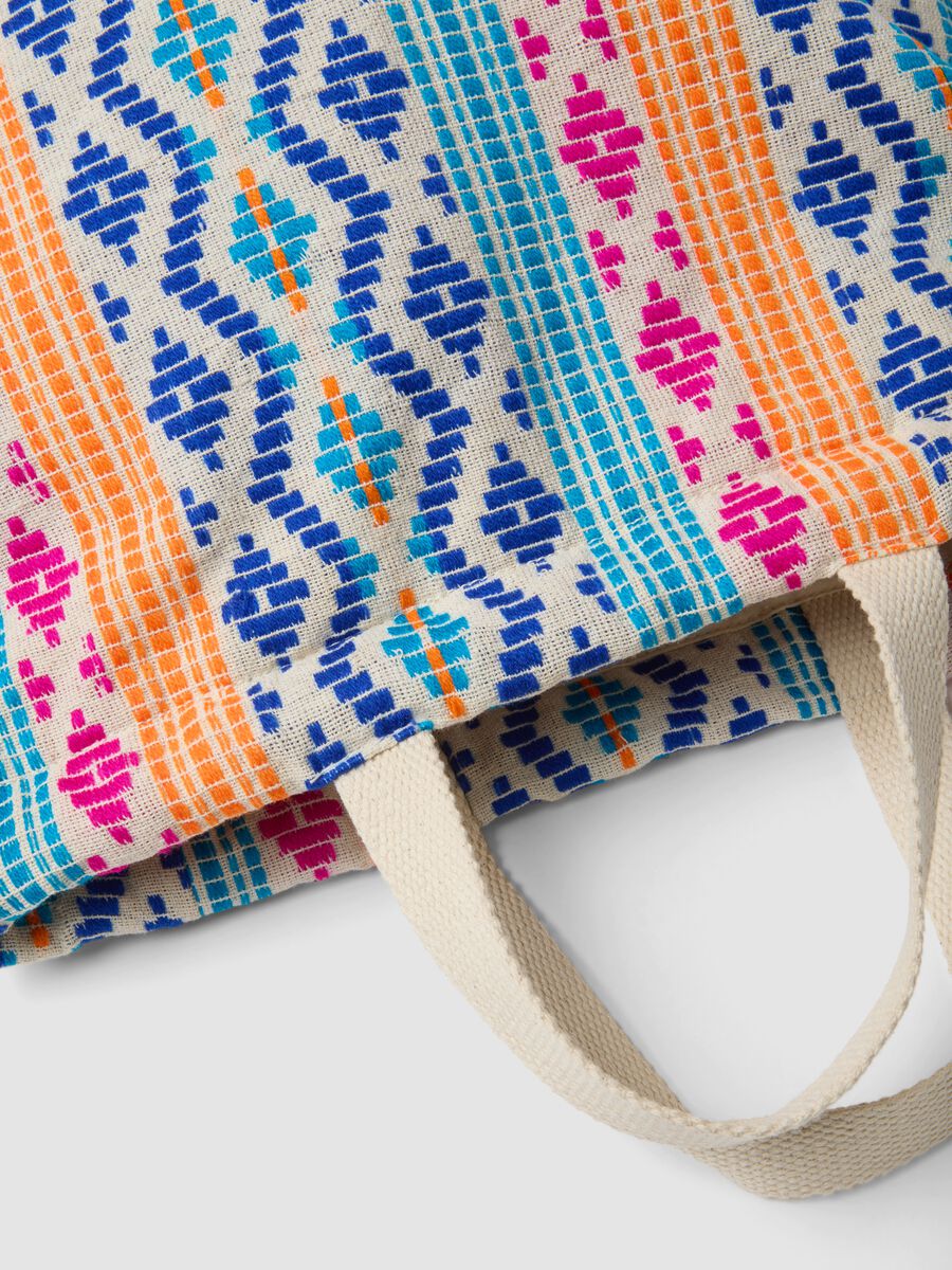 Zaino con fantasia multicolor e spallacci regolabili_2