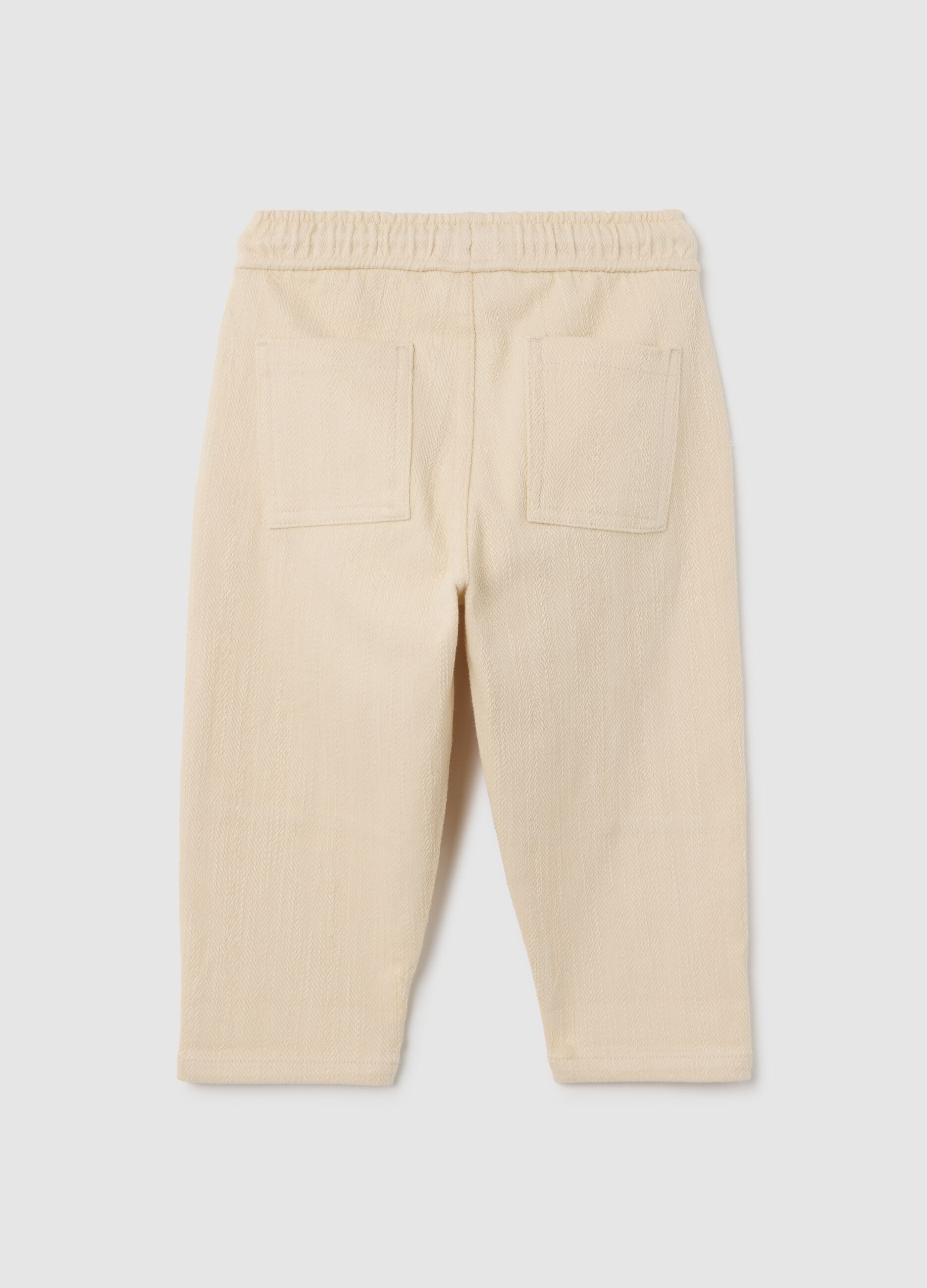 Children's trousers in beige cotton blend over
