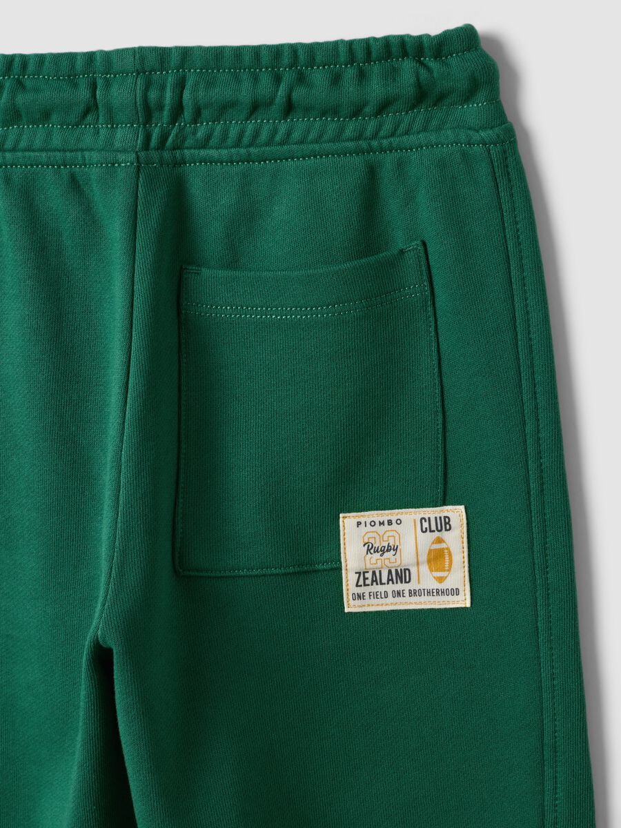 Pantaloni jogger verdi in puro cotone con vita elasticizzata per bambino_3