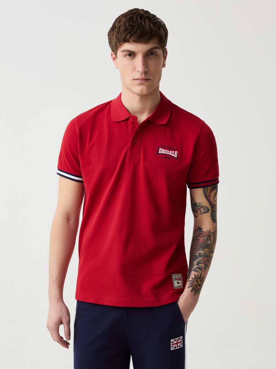 Polo shirt with striped edging and logo embroidery_0